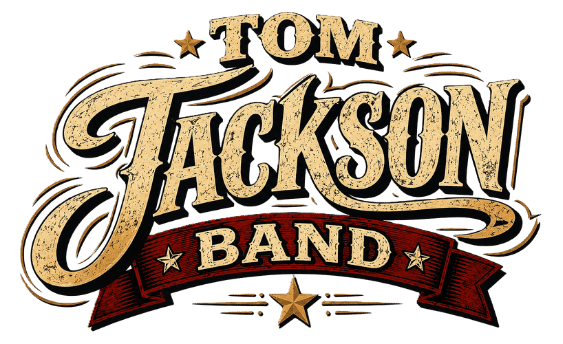 Vintage western-style Tom Jackson Band logo featuring distressed cream lettering, ornate script typography, red ribbon banner accents, and gold stars with a rugged country music aesthetic.