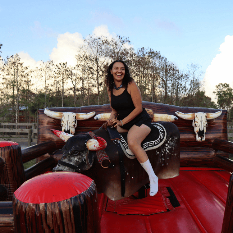 Mechanical bull riding at Hobe Sound Farms Line Dancing